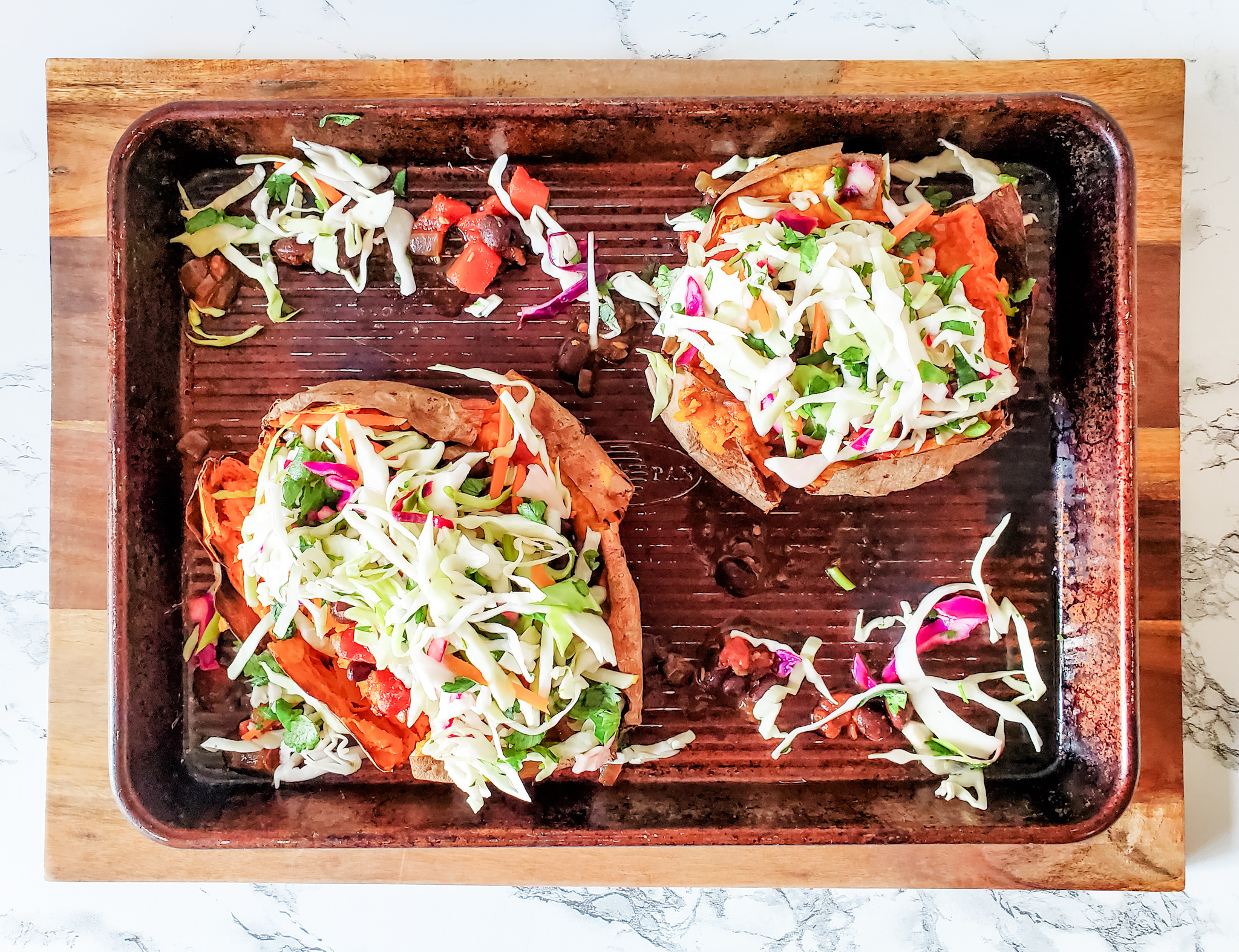 Sweet Potatoes with Black Bean Chili and Cilantro-Lime Slaw